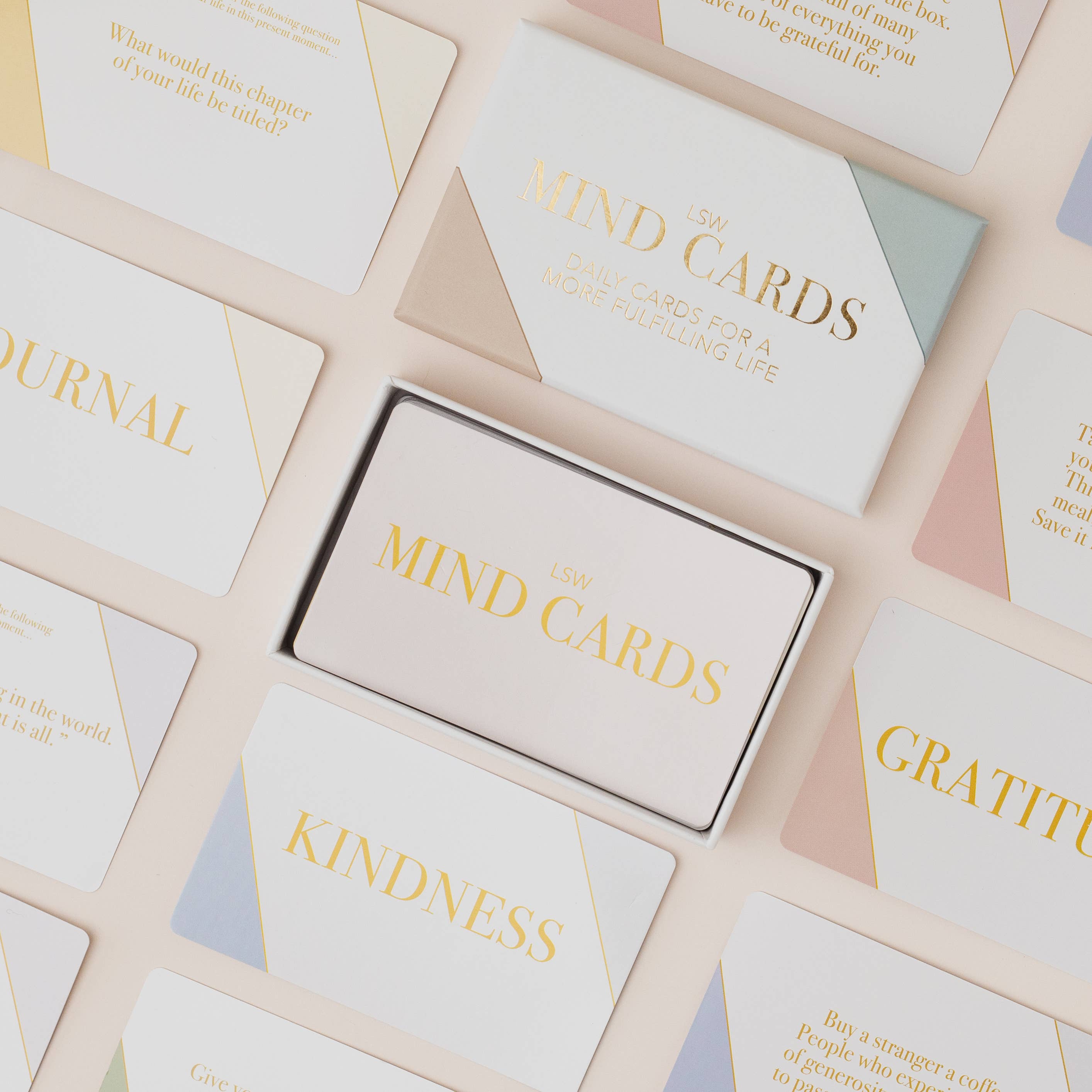 Set of 'Mind Cards' with various cards spread out on a surface.