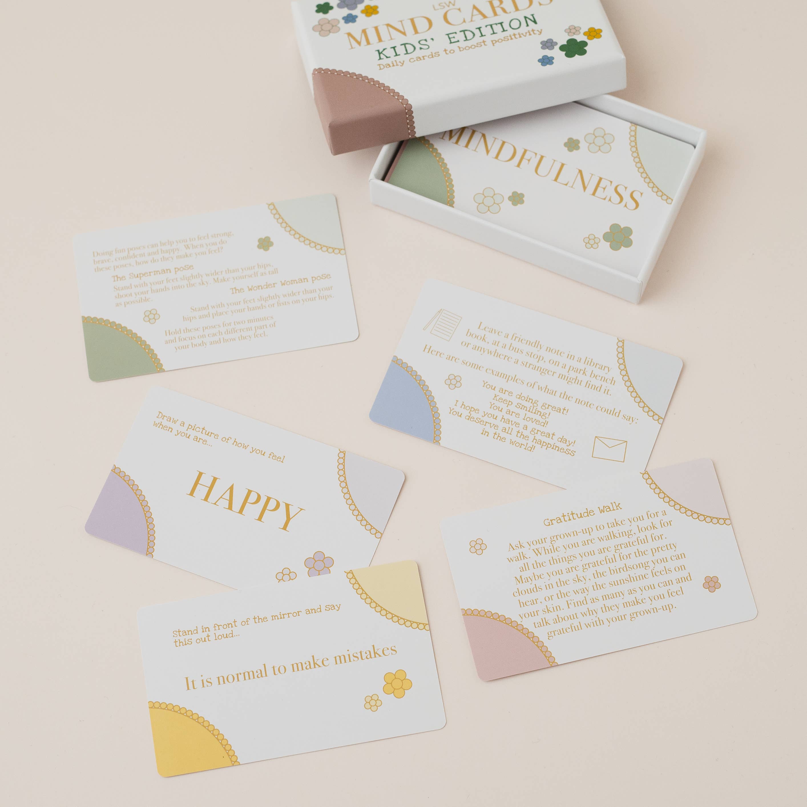 Mindfulness cards with a box labeled 'Mindfulness Kids Edition' on a beige background
