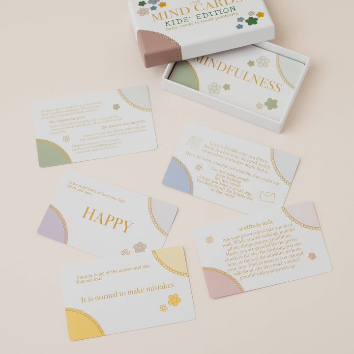 Mindfulness cards with a box labeled 'Mindfulness Kids Edition' on a beige background