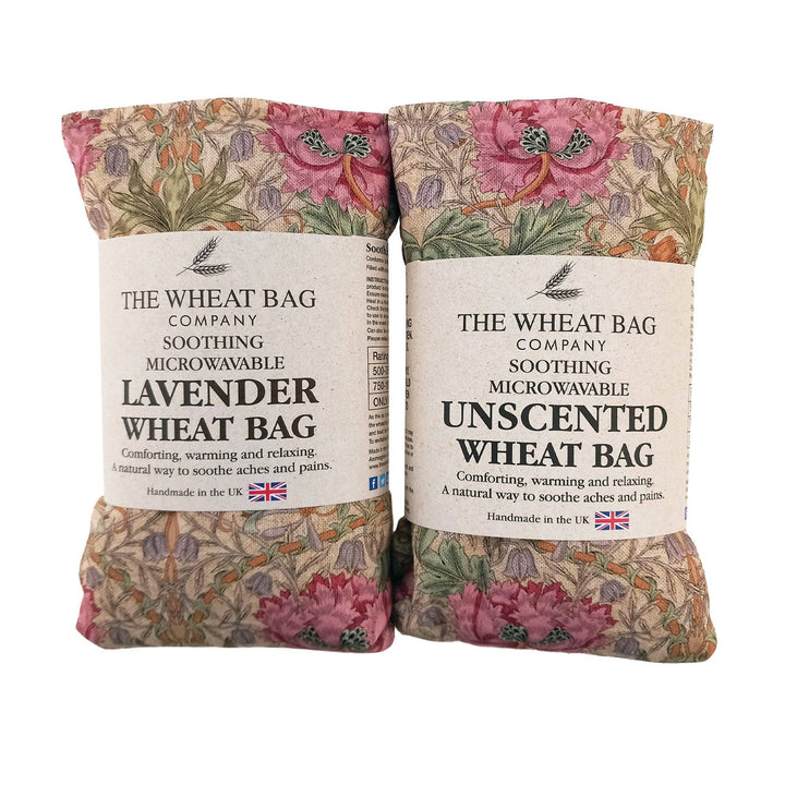 Two wheat bags with floral packaging, one lavender and one unscented, from The Wheat Bag Company.