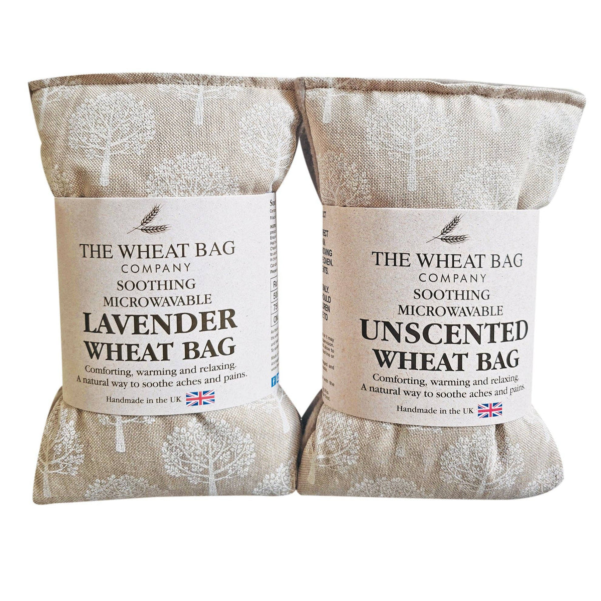 Two beige wheat bags with white tree patterns and labels from The Wheat Bag Company, one labeled Lavender and one labeled Unscented, on a white background.