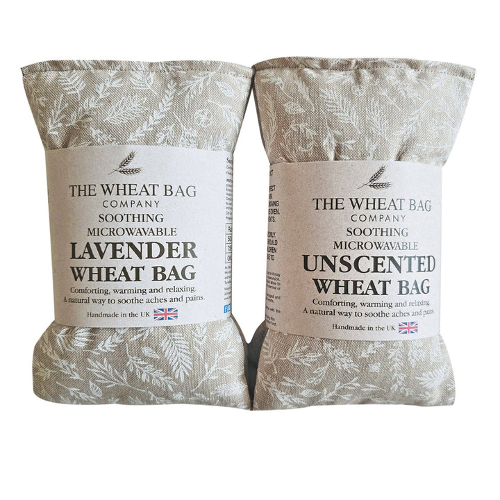 Two wheat bags, one lavender and one unscented, from The Wheat Bag Company on a white background.