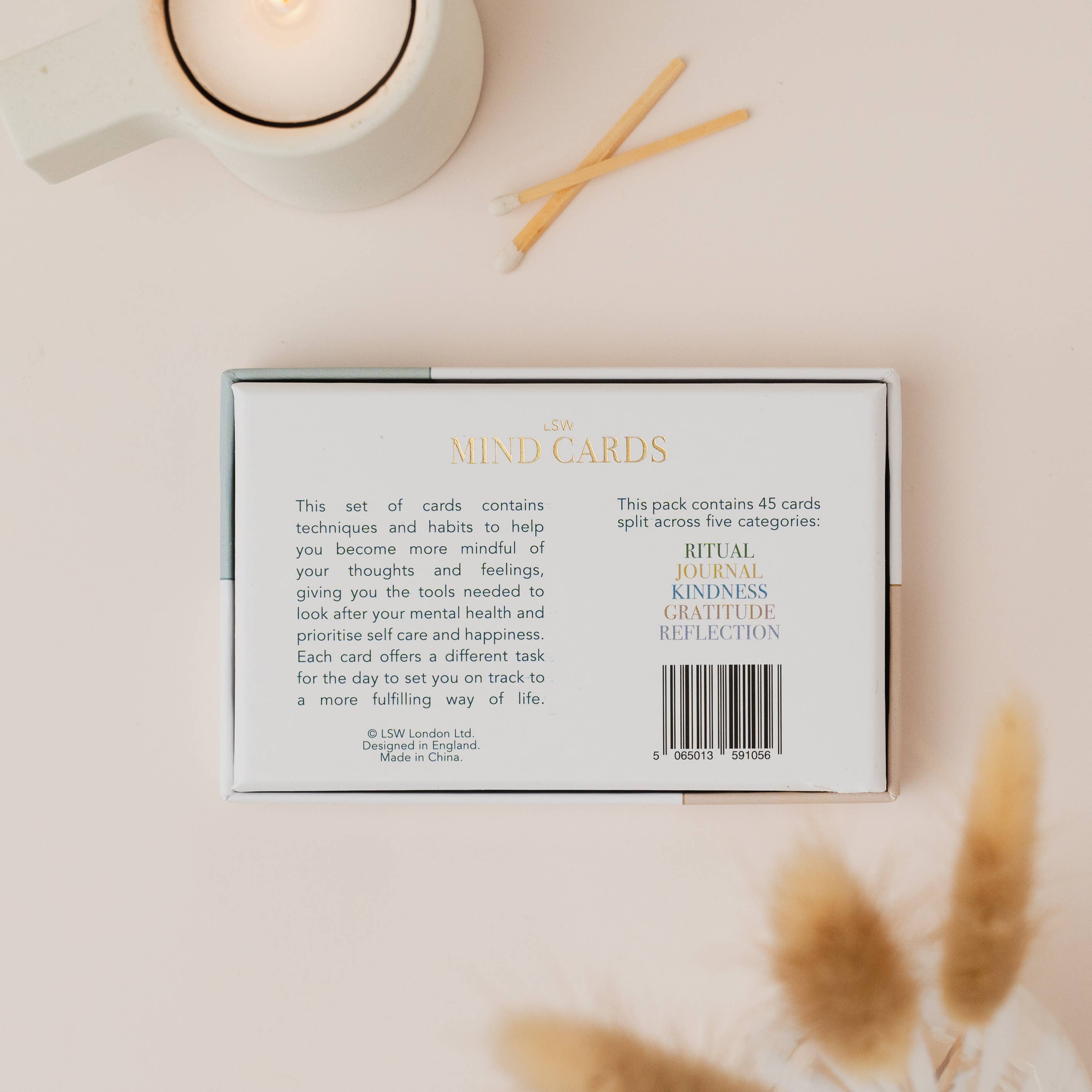 Mind Card set packaging with text on a light background