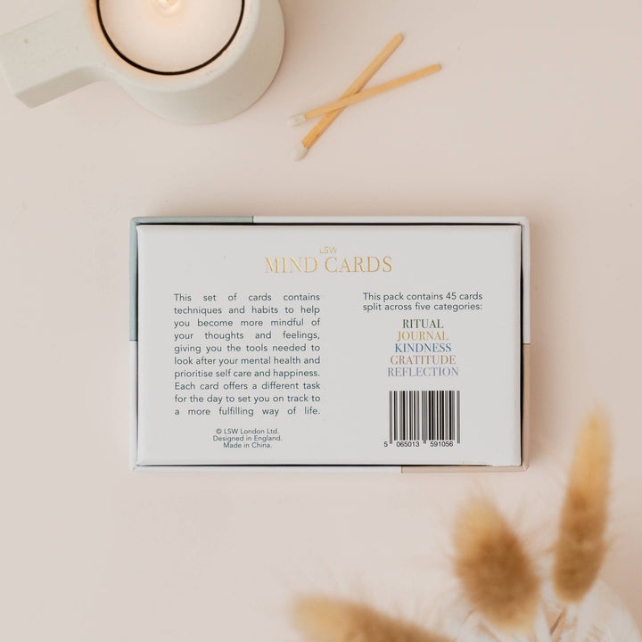 Mind Card set packaging with text on a light background