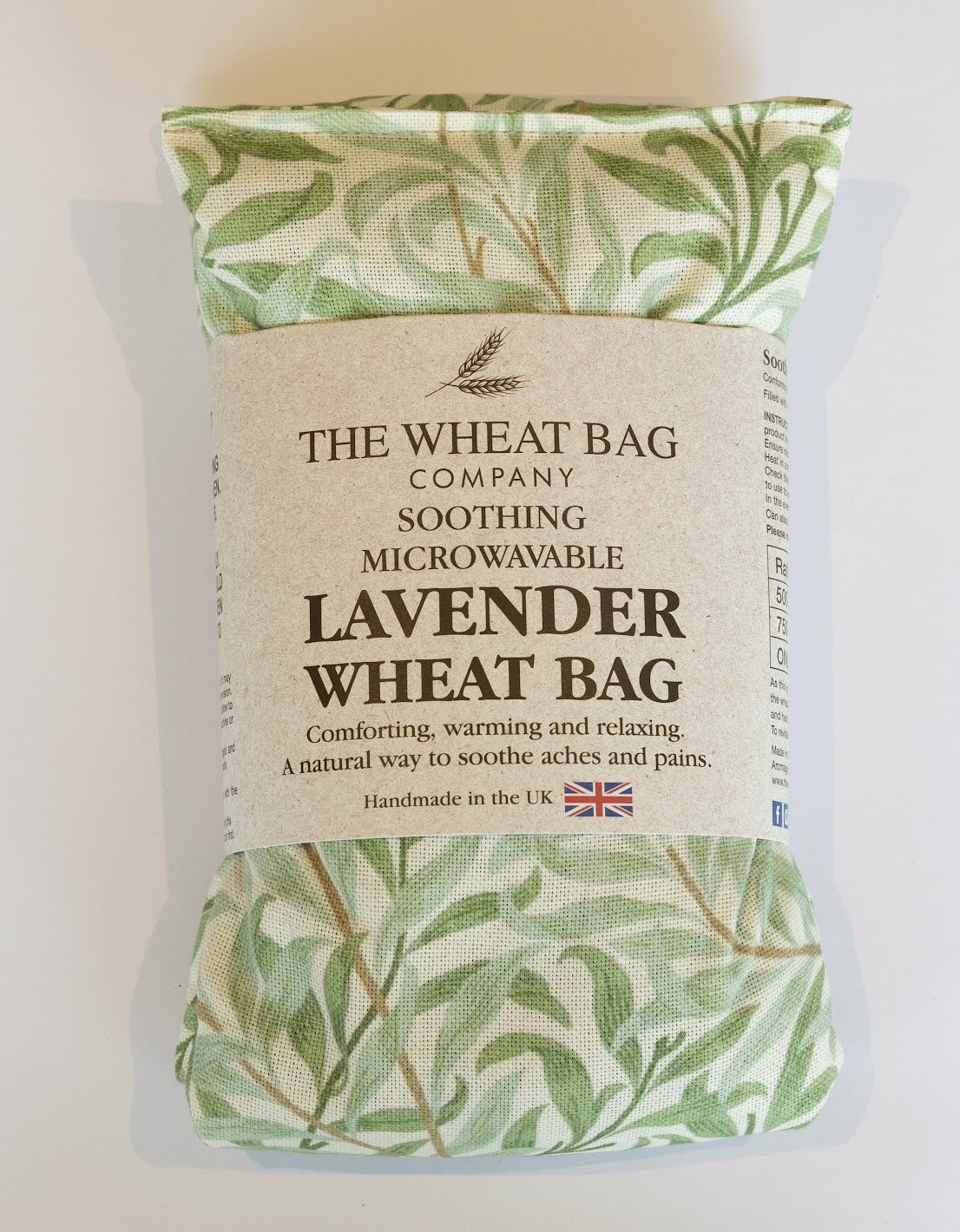 Lavender wheat bag with William Morris Willow Sage pattern packaging on a white background