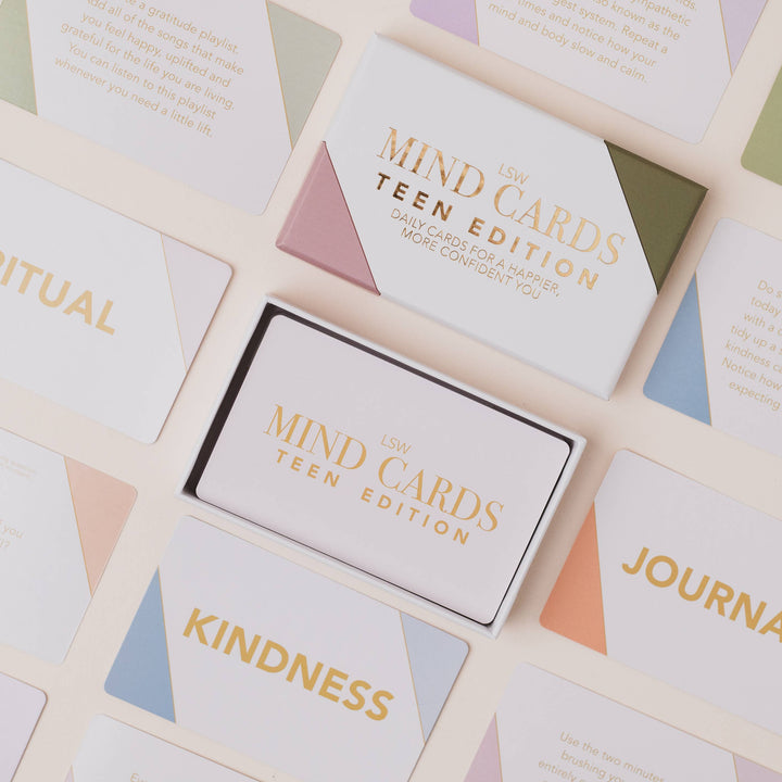 Mind card box labeled 'MIND CARDS TEEN EDITION' surrounded by cards with text on a patterned background.